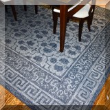 DR02. Blue patterned rug. Approx. 12' x 9' 